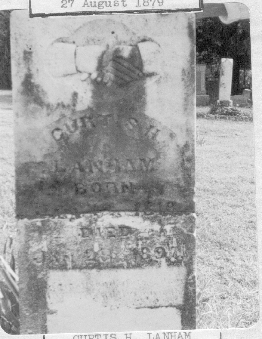 black and white photo of gravestone