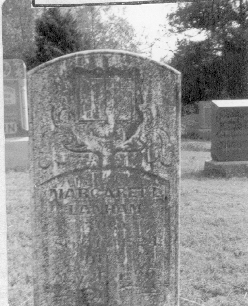black and white photo of gravestone