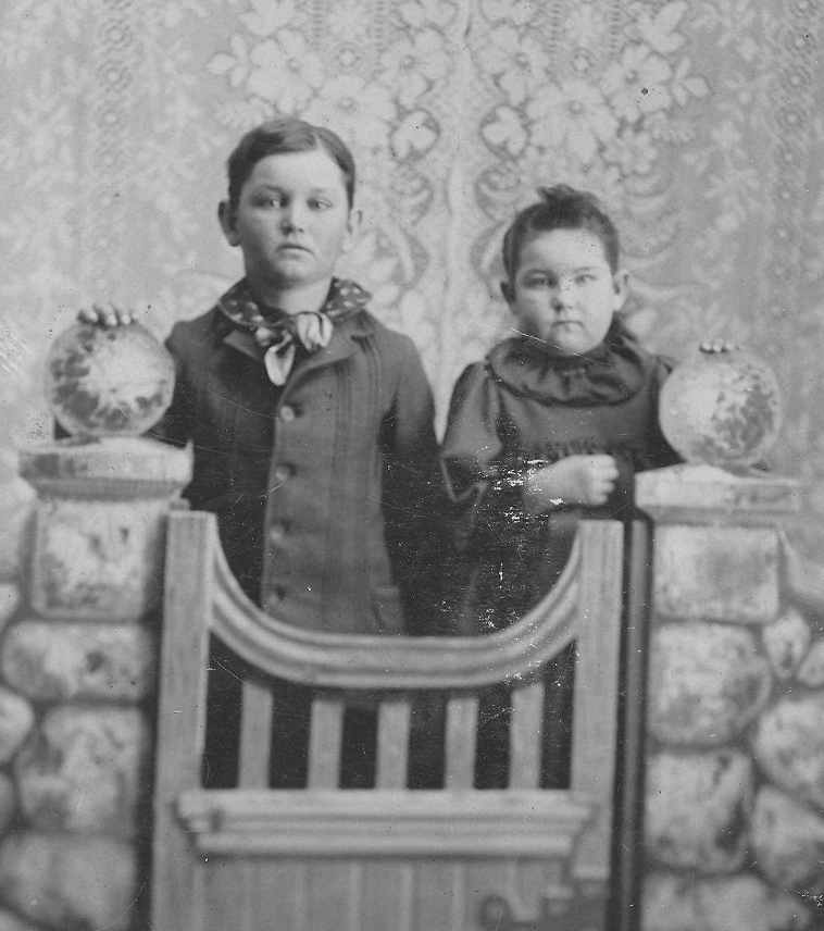 black and white photo of two children